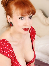 Elegant hottie Red undresses
